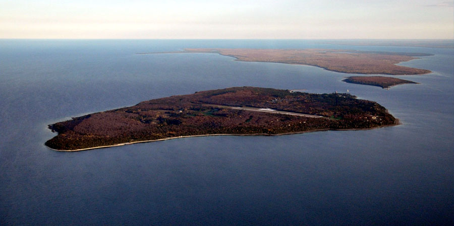 Mackinac Island as viewed from the northwest. Bois Blanc Island and Lake Huron lie in the distance.